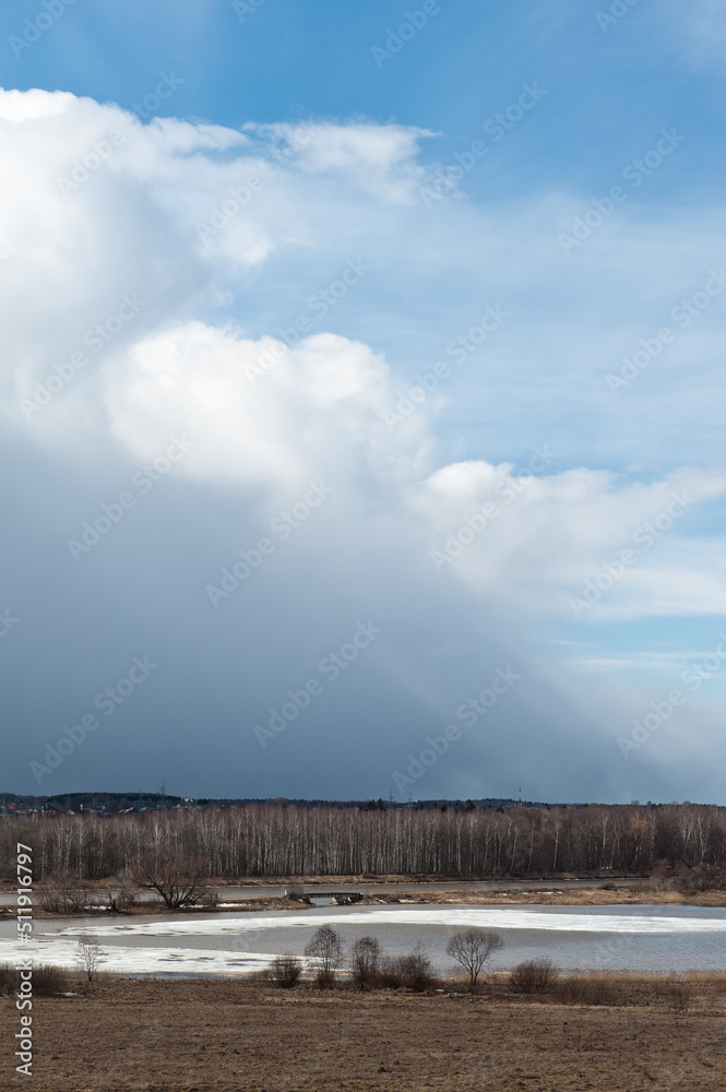 Spring landscape. Early spring. A lake with ice and beautiful thundery skies. Spring landscape. Early spring. A lake with ice and beautiful thundery skies.