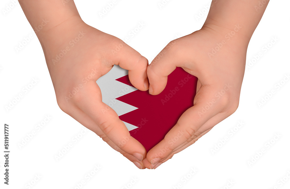 Obraz premium Kid's hands in heart- form. National peace concept on white background. Bahrain