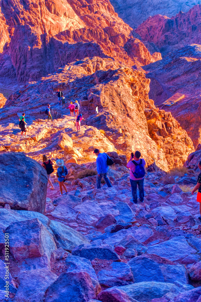 Tourists are going down the path of Jabal Musa or Mount Sinai in Egypt.