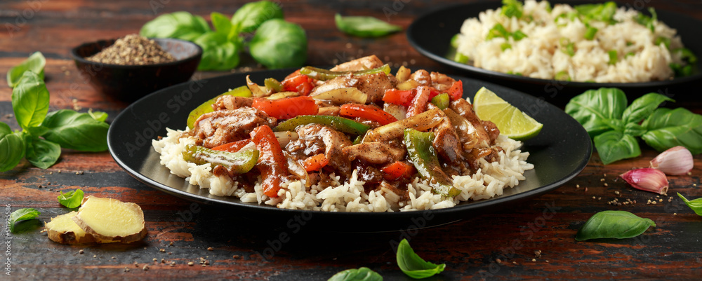 Stir fry pepper chicken with sweet peppers, onion, garlic and ginger Stir fry pepper chicken with sweet peppers, onion, garlic and ginger