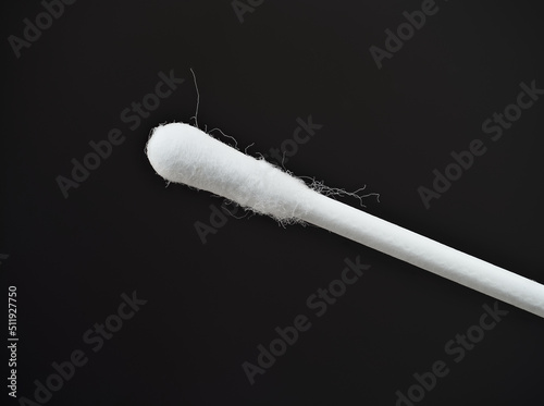 Cotton swab in white on black