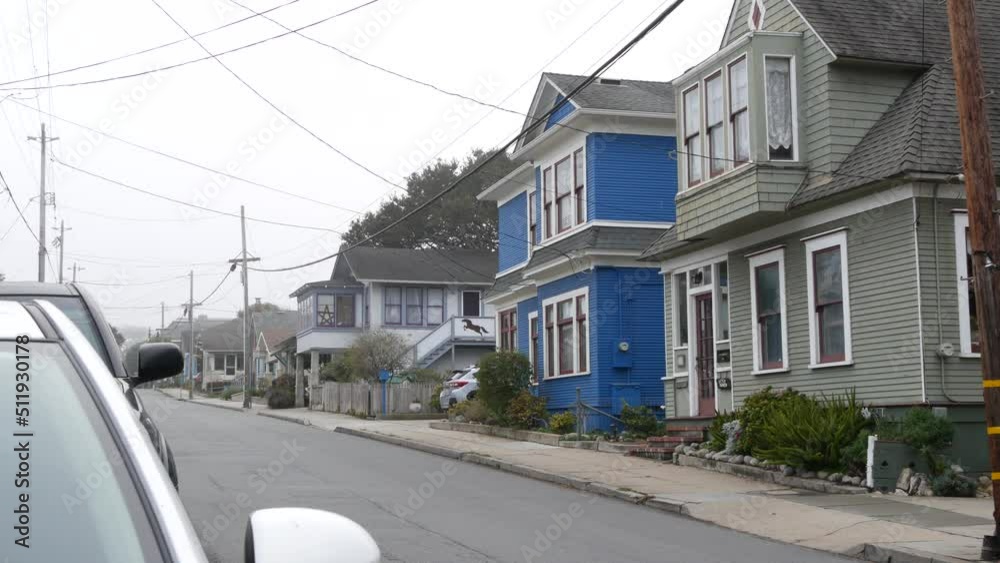 Row of old victorian style houses, historic residential district, Monterey, California USA. Colonial architecture, retro vintage suburban wooden classical cottages. Real estate property, city street. Row of old victorian style houses, historic residential district, Monterey, California USA. Colonial architecture, retro vintage suburban wooden classical cottages. Real estate property, city street.