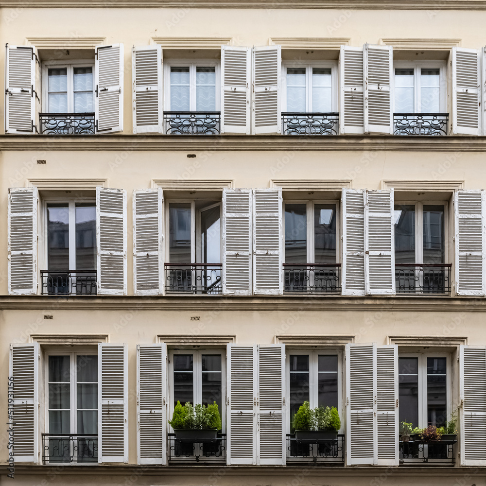 Paris, beautiful building, boulevard Beaumarchais, in the 11e district, typical windows
