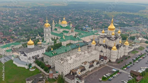 Ukraine. Aerial view to largest Orthodox church complex monastery Dormition Pochayiv Lavra was founded on a mountain near the town of Novy Pochaev in 1240, Ukraine. photo
