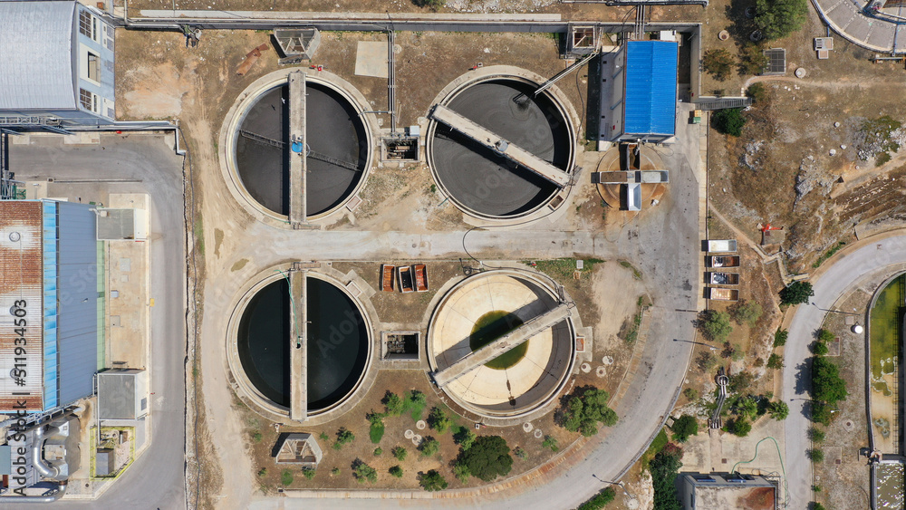 Aerial drone top view photo of round waste separators in sewage treatment plant of Psitaleia, Piraeus, Attica, Greece
