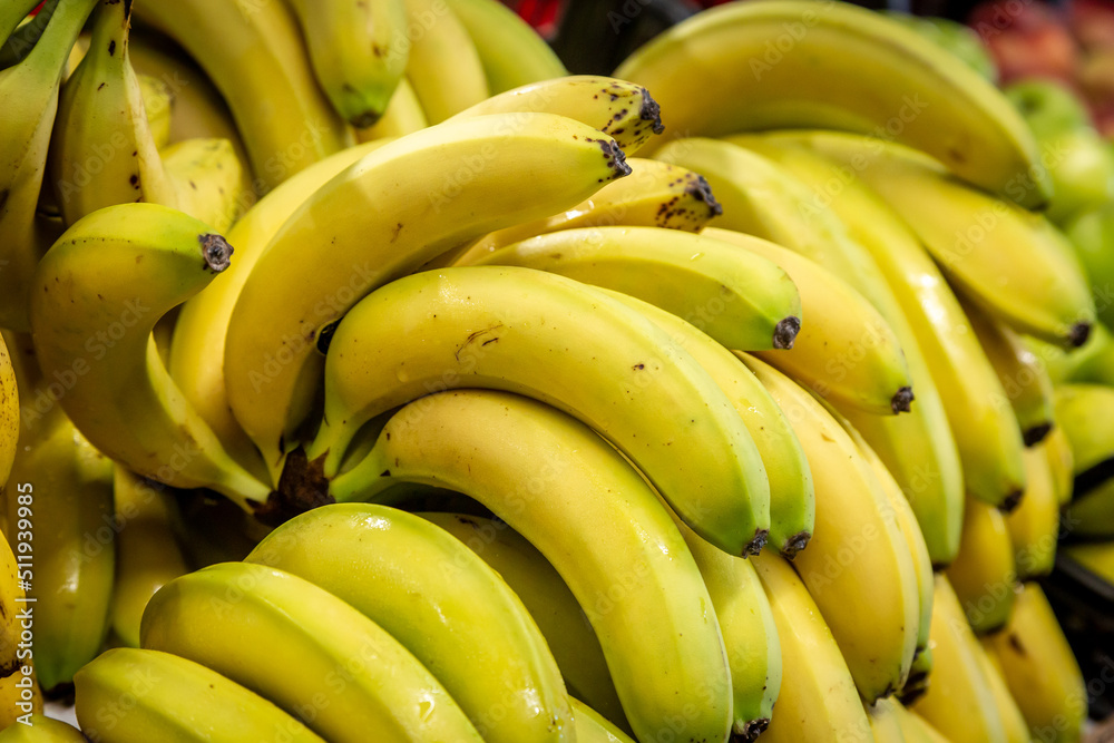 An abundance of bananas for sale on a market stall