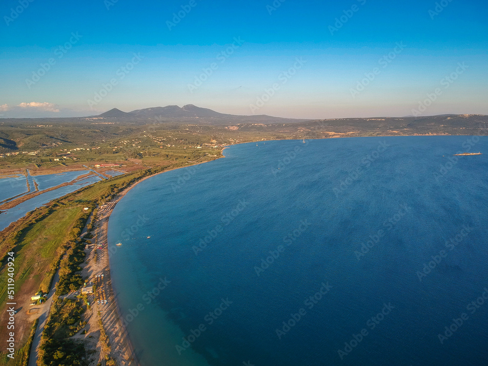 Obraz premium Panoramic aerial view over Divari beach near Navarino bay, Gialova. It is one of the best beaches in mediterranean Europe. Beautiful lagoon near Voidokilia from a high point of view, Messinia, Greece