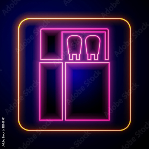 Glowing neon Open matchbox and matches icon isolated on black background. Vector