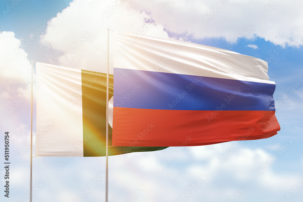 Sunny blue sky and flags of russia and pakistan Sunny blue sky and flags of russia and pakistan