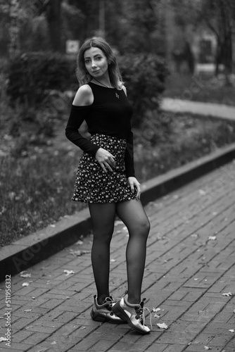Beautiful woman in the park in black and white
