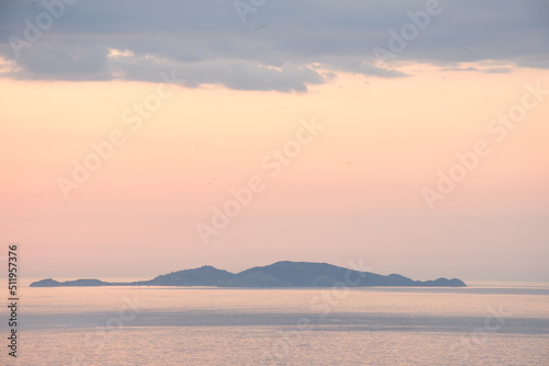 Beautiful summer sunset in Cape drastis in Peroulades, Corfu, Greece