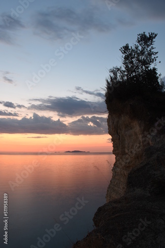Beautiful summer sunset in Cape drastis in Peroulades, Corfu, Greece