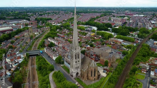 Aerial falling clip of the Spire of the Shrine Church of St. Walburge's Preston Lancashire England photo