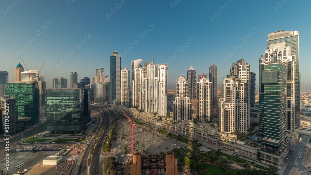 Bay Avenue during sunrise with modern towers in Business Bay aerial panoramic timelapse, Dubai