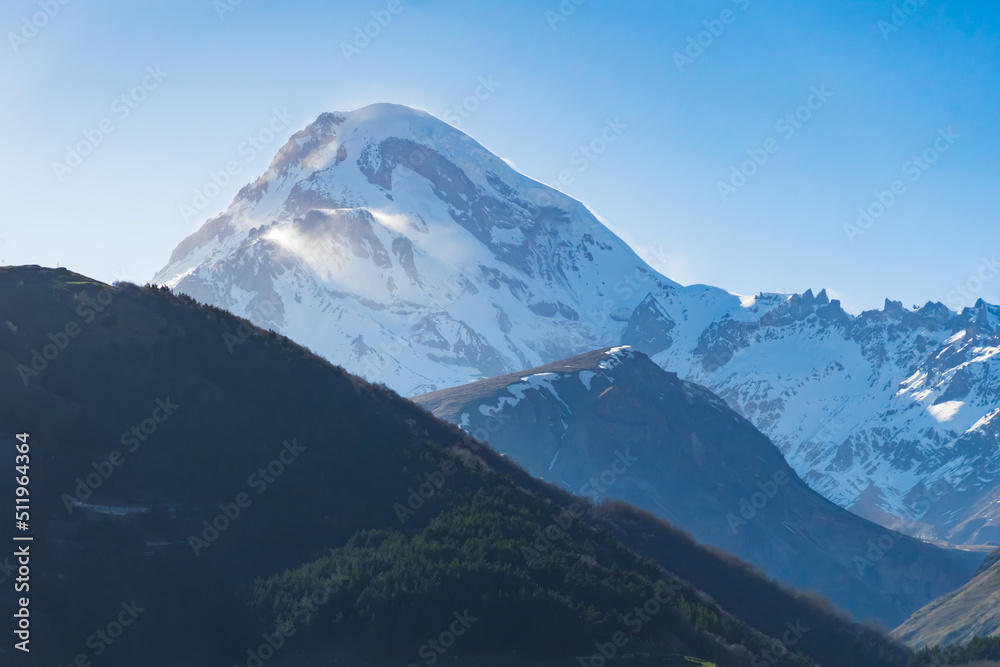 majestic shot of snowcapped mountain Mkinvartsveri, Kazbegi, Georgia. High quality photo majestic shot of snowcapped mountain Mkinvartsveri, Kazbegi, Georgia. High quality photo