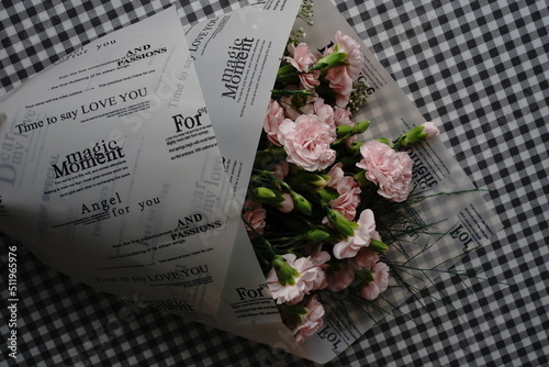 pink carnations and a bouquet photo