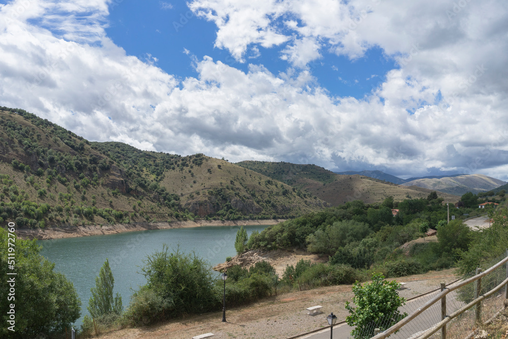 Beautiful Mansilla reservoir on a summer day with some clouds in the sky, Spain Beautiful Mansilla reservoir on a summer day with some clouds in the sky, Spain