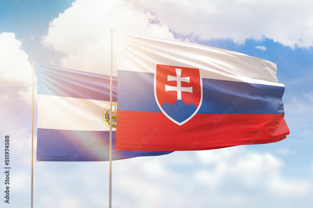 Sunny blue sky and flags of slovakia and el salvador - obrazy, fototapety, plakaty 