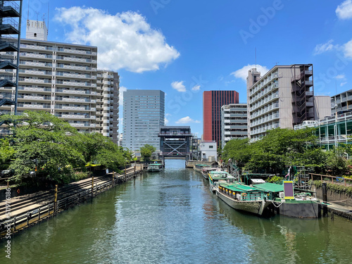 Nostalgic houseboats and the water gate floating on the canals of Tokyo in Japan