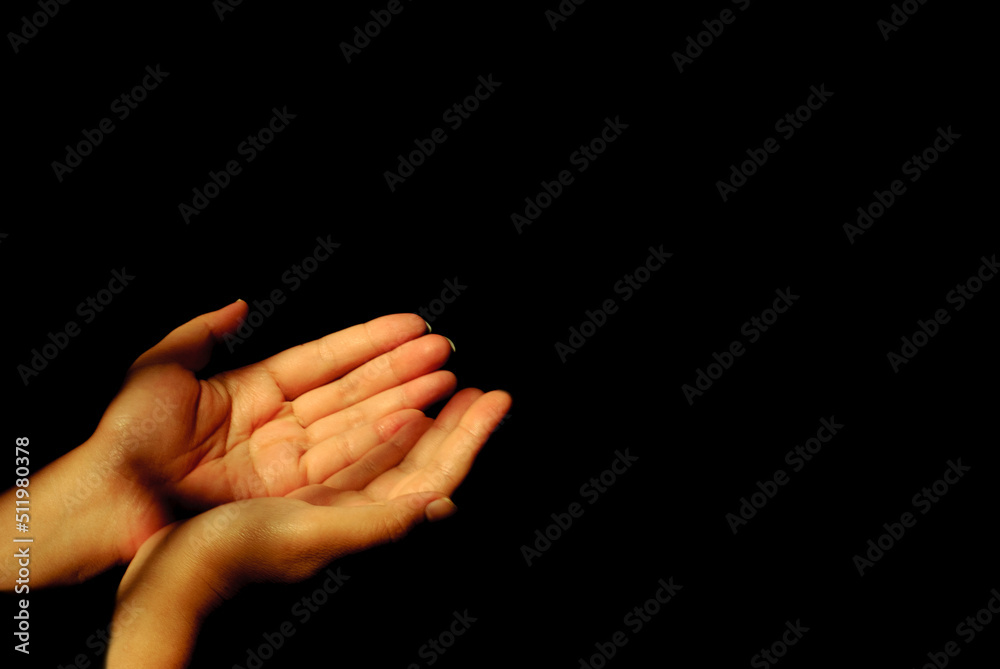 empty hands on black background with lights,wishes,freedom,liberty,peace,liberty concept empty hands on black background with lights,wishes,freedom,liberty,peace,liberty concept