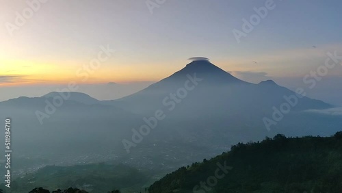 time-lapse of the view of Mount Sindoro in Sikunir, Wonosobo when the sun rises photo