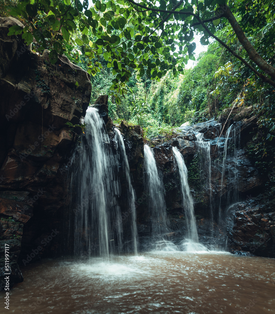 Obraz premium Waterfall in the tropical forest in the rainy season