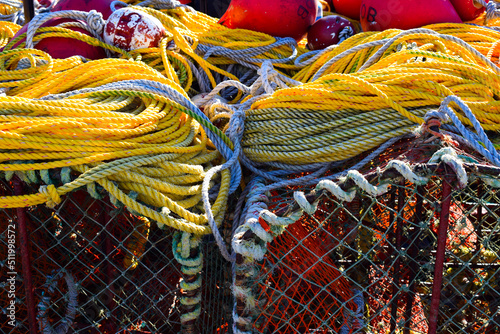 Colorful fishing lobster and crab baskets with blue and orange nets