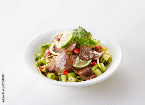Delicious Chinese food, cold salad with lemon and beef tendon