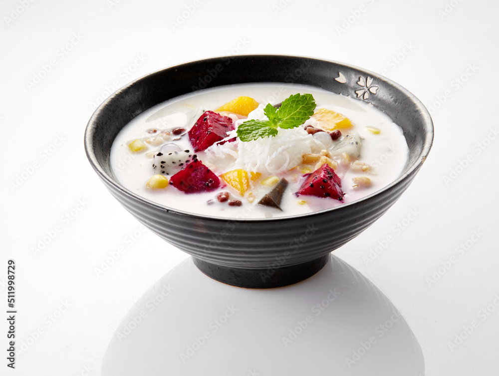 Delicious dessert, assorted fruit in coconut milk