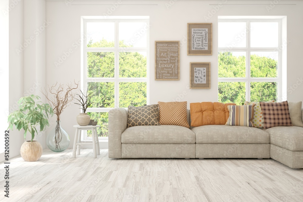 Fototapeta premium White living room with sofa and summer landscape in window. Scandinavian interior design. 3D illustration