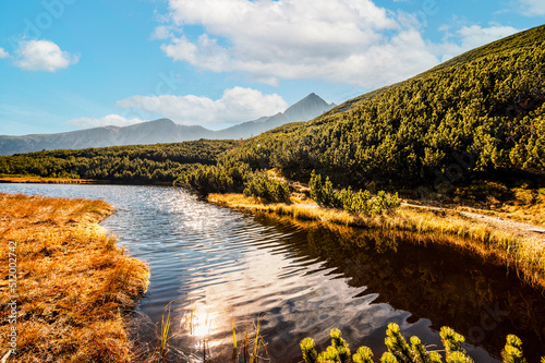 Hiking in national park High Tatras. HiIking to biele pleso near zelene pleso in the mountain Vysoke Tatry, Slovakia. Beautiful photo