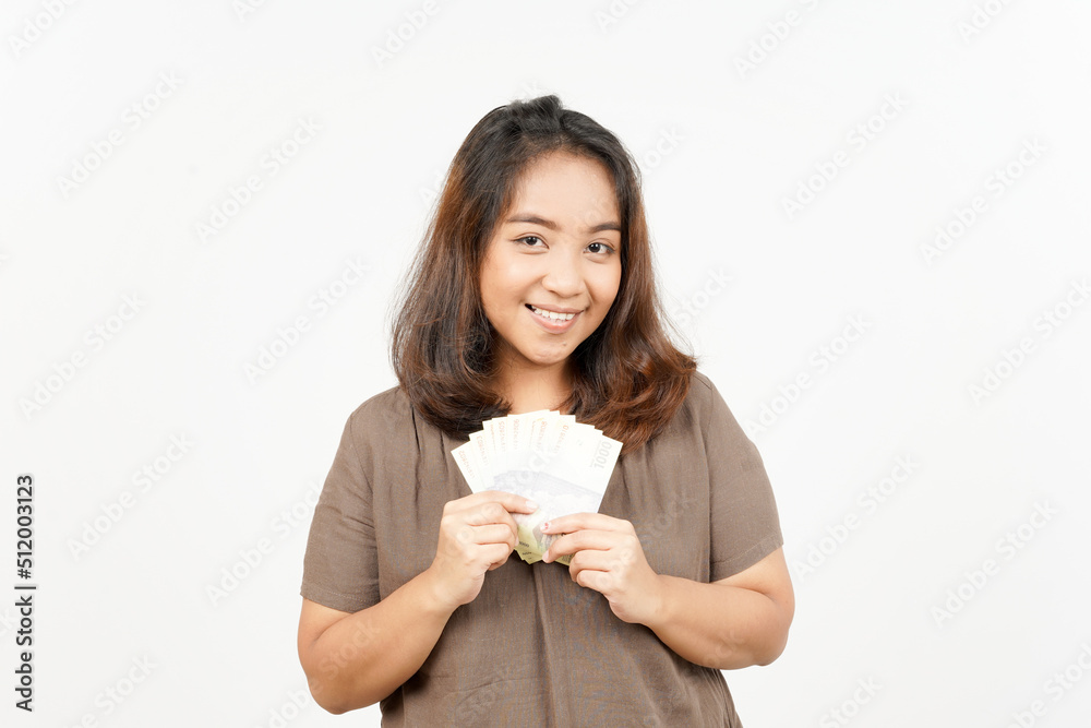 Holding banknote one thousand rupiah of Beautiful Asian Woman Isolated On White Background Holding banknote one thousand rupiah of Beautiful Asian Woman Isolated On White Background