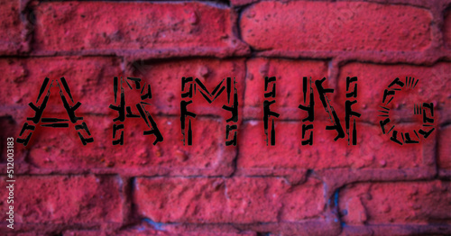 The word Arming made of pistols and machine guns on the background of a red wall