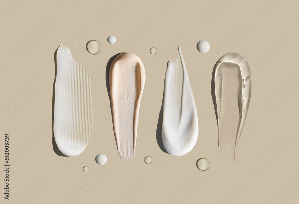 cosmetic smears of creamy texture on a pastel background - obrazy, fototapety, plakaty 