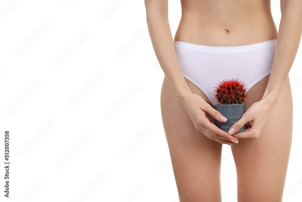 Concept of female health, woman holds cactus, isolated on white background Concept of female health, woman holds cactus, isolated on white background