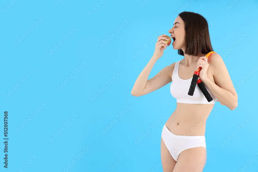 Concept of weight loss with attractive young woman, space for text Concept of weight loss with attractive young woman, space for text