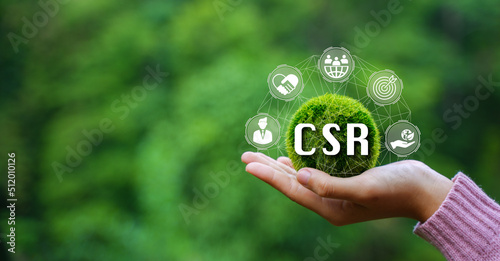 Corporate social responsibility and community giving back CSR icon concept on green nature background.