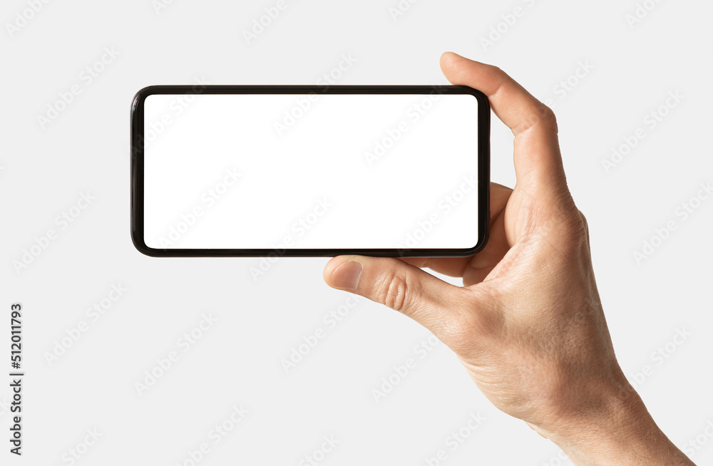 Hand holding smartphone with white mockup screen isolated on white background for web site design, logo, app - clipping path Hand holding smartphone with white mockup screen isolated on white background for web site design, logo, app - clipping path