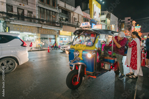 Photography Tuk tuk or skylab at night in chinatown or Yaowarat, Chinatown is the famous street food of Thailand, Chinatown or Yaowarat