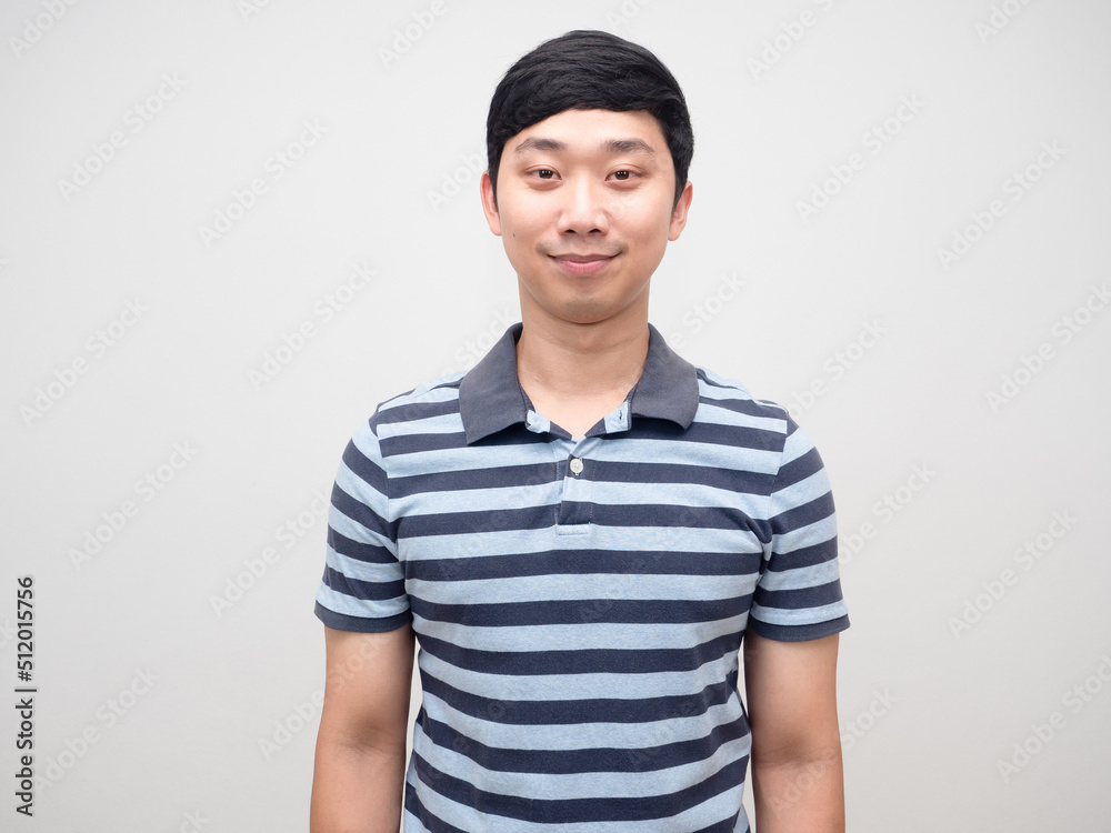 Portrait young man striped shirt gentle smile isolated