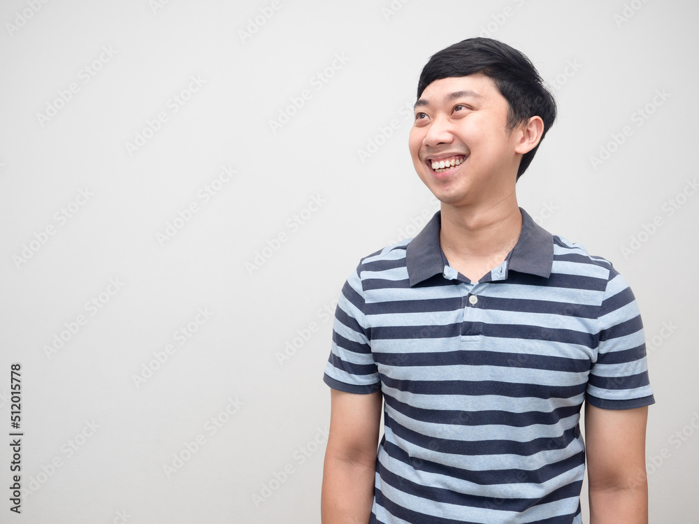 Man striped shirt happiness smile looking at copy space Man striped shirt happiness smile looking at copy space