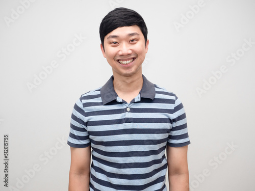 Asian positive man striped shirt gentle smile isolated