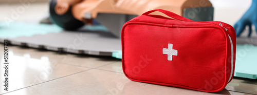 Medical kit on floor at first aid training courses photo