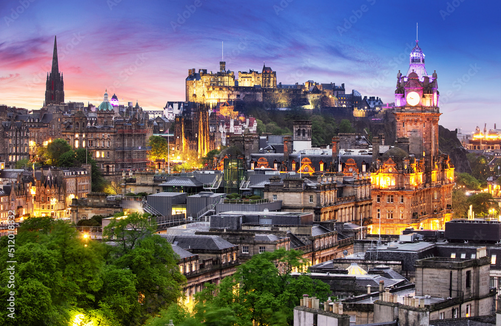 Edinburgh skyline at night with castle in Scotland, UK