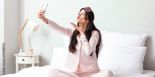 Pretty young woman taking s...