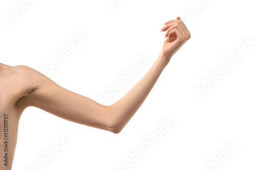 Fotografia Young woman's loose stretched arm and palm