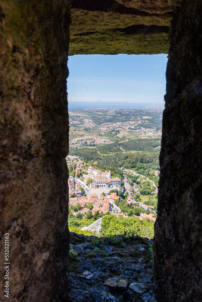 A view of a the small Portuguese town of Sintra as seen through a stone window