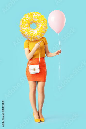 Woman with balloon and tast...
