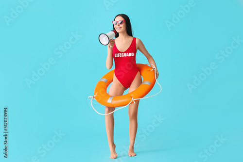 Female beach rescuer with l...