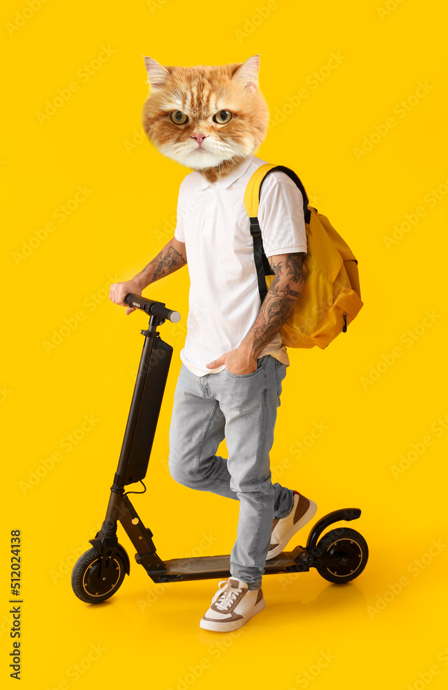 Tattooed student with head of cat and kick scooter on yellow background  Stock Photo | Adobe Stock